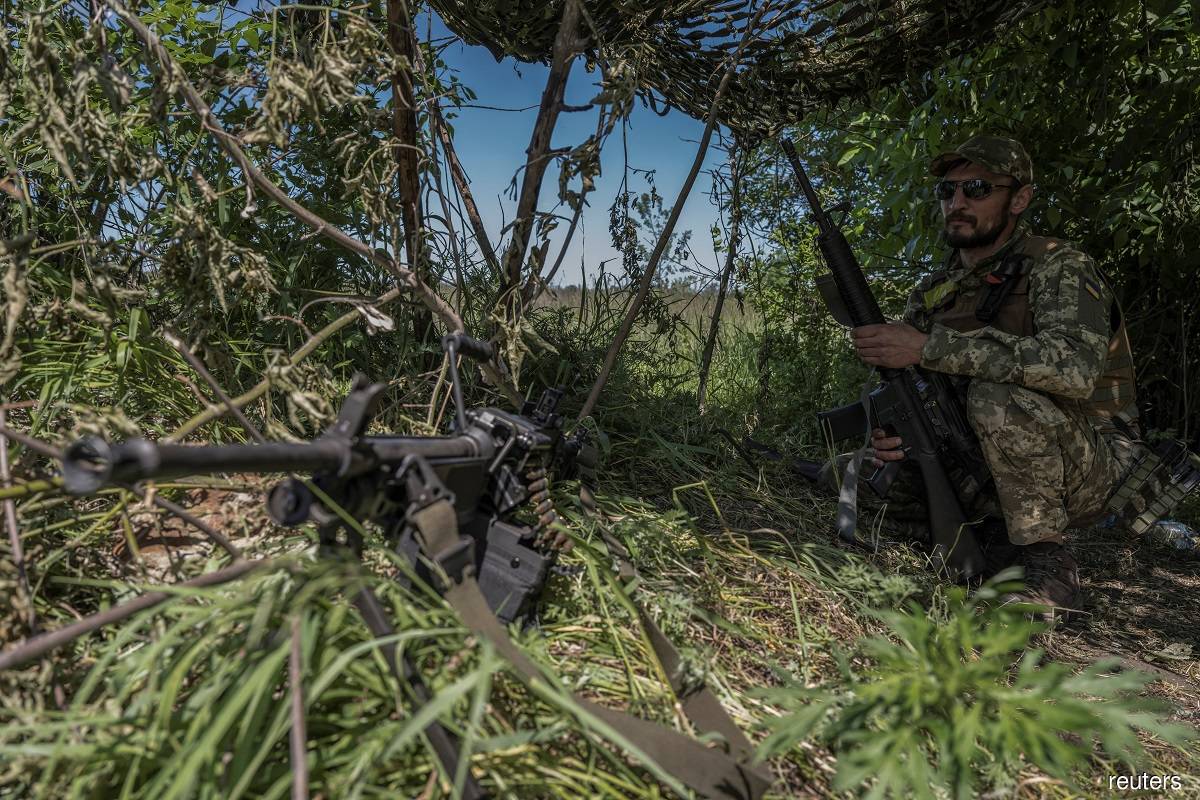 A Ukrainian serviceman looks on near the Ukraine-Russia border, amid Russia's attack on Ukraine, in Kharkiv region, Ukraine June 4, 2023. (Reuters pic)
